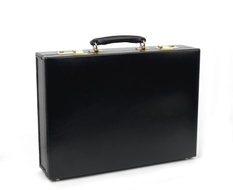 A gentleman's leather briefcase by Swaine Adeney Brigg,in black English Bridle Leather with handle, combination lock fastenin