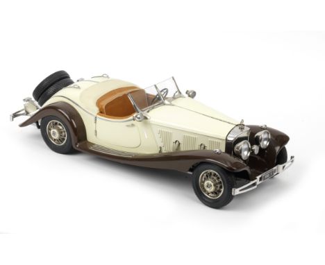 A 1:8 scale model of a 1935 Mercedes-Benz 500K Cabriolet, by Pocher,constructed model kit from plastic and metal parts, depic