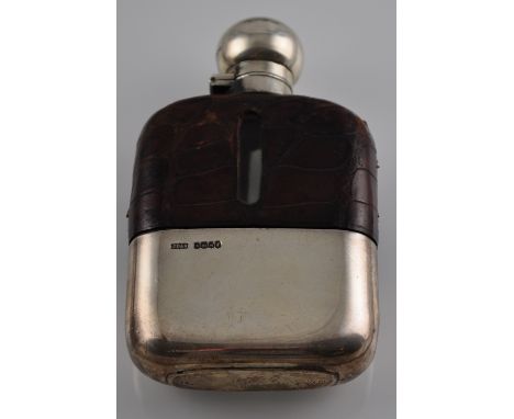 A George V silver mounted crocodile skin covered glass hip flask with detachable cup base, James Dixon & Son, Sheffield 1935,