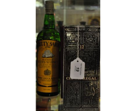 A one litre bottle of Cutty Sark scotch whisky together with a bottle of Dimple Whisky and a bottle of Chevas Regal whisky