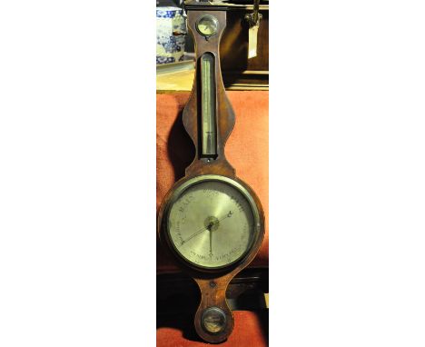 An early 19th Century boxwood strung mahogany wheel barometer thermometer hygrometer with silvered scales marked Cattanio Ayl
