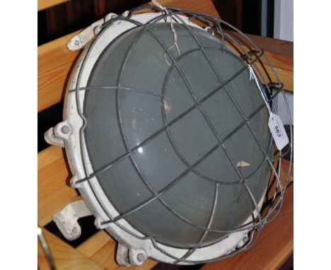 An industrial circular wall/ceiling light, with protective wire cage. D. 41.5cm