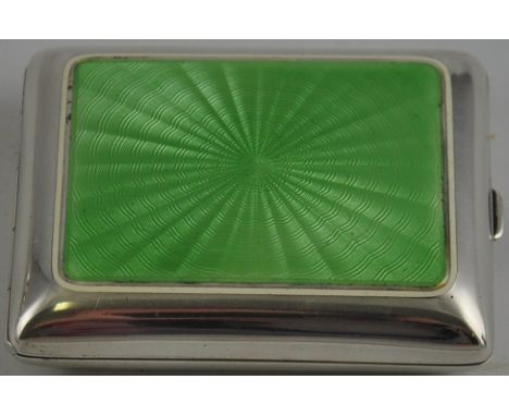 A silver Tiffany & Co box with green apple enamel