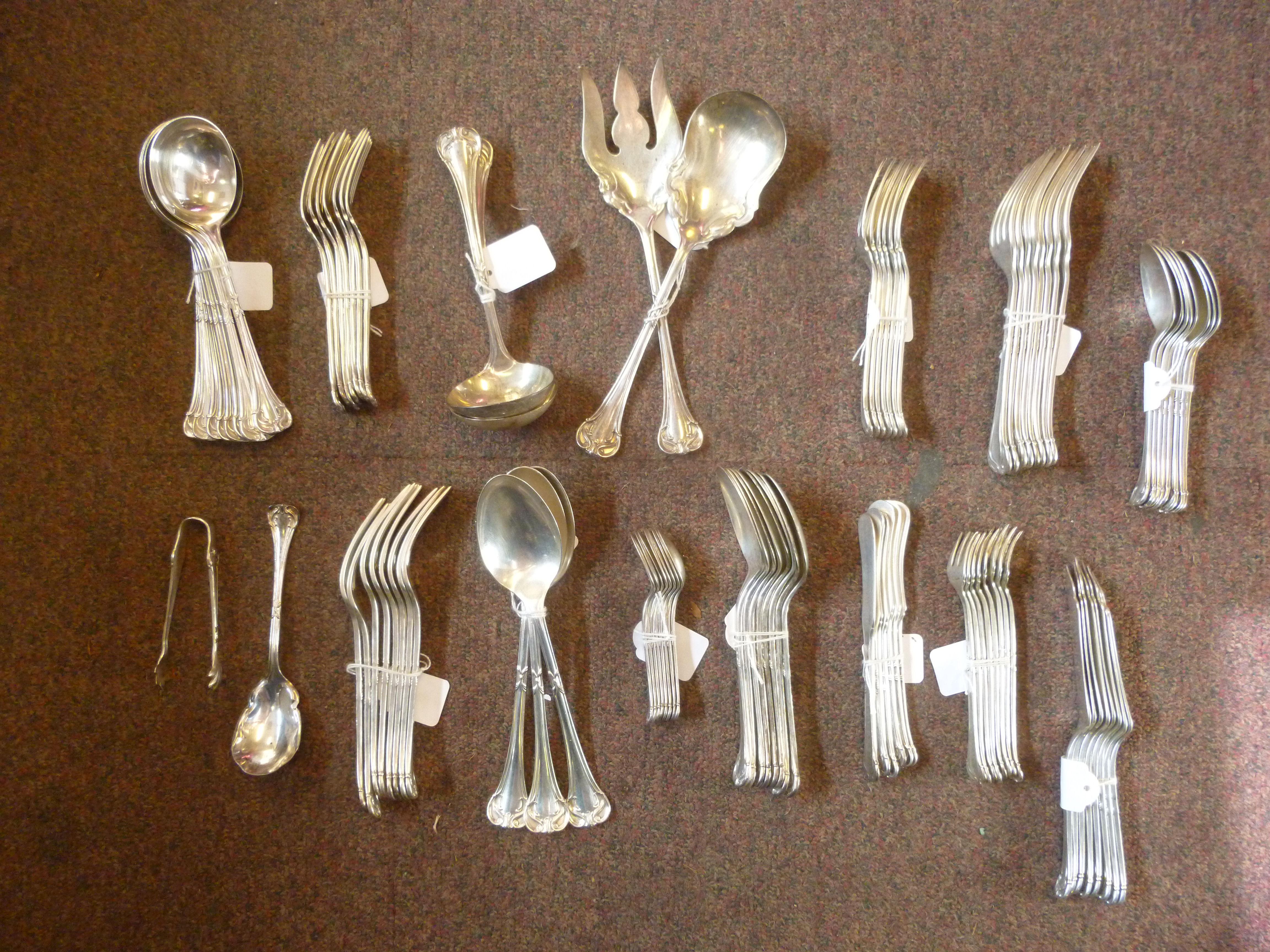 An almost complete service of Mexican Sterling silver flatware with