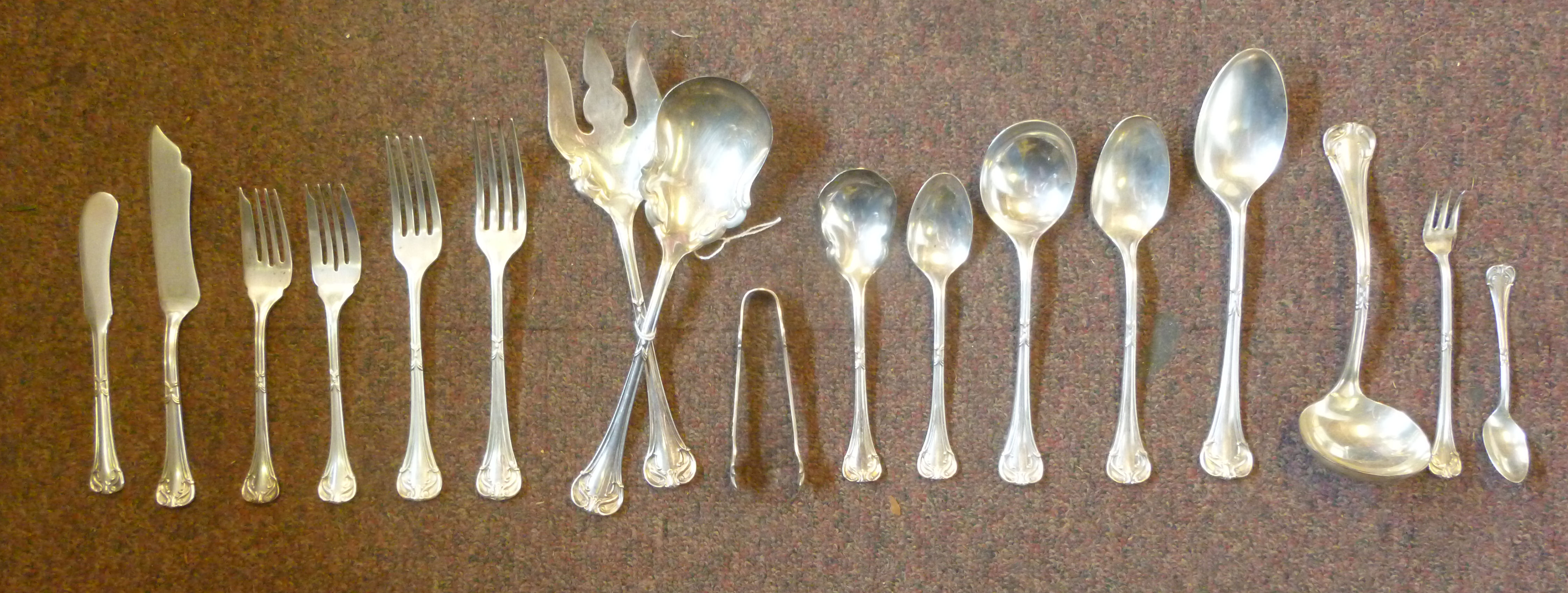 An almost complete service of Mexican Sterling silver flatware with