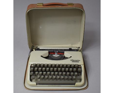 A Cased Olympia Splendid 33 Manual Portable Typewriter 