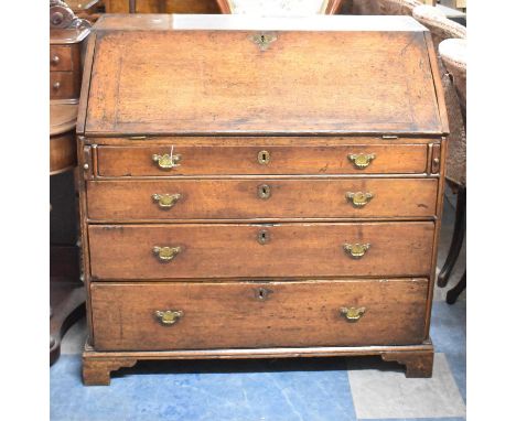 A George III Oak and Mahogany Cross Banded Bureau with Fall Front to Fitted Interior and Having Four Drawers to Base, Bracket