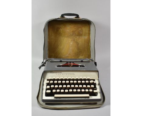 A Vintage Remington Monarch Manual Typewriter in Travelling Bag 