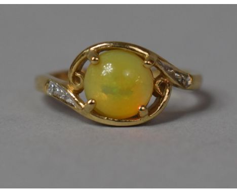 A 9ct Gold Dress Ring with Mexican Fire Opal Centre Stone and Diamond Chips, Size N 