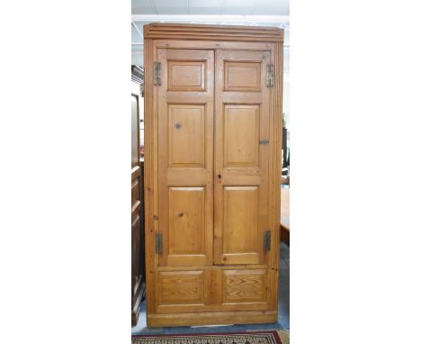 A Pine Double Freestanding Corner Cupboard with Panelled Doors and Four Shelf Interior, 212cm and 99cm Wide 