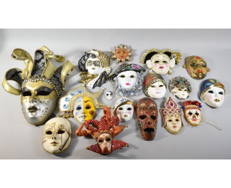 A Collection of Various Wall Hanging Ceramic and Metal Masks 