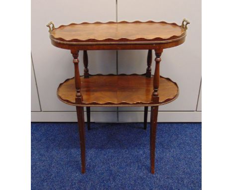 A mahogany two tier buffet tea table with two brass handles on four tapering rectangular legs, 72 x 60.5 x 41cm