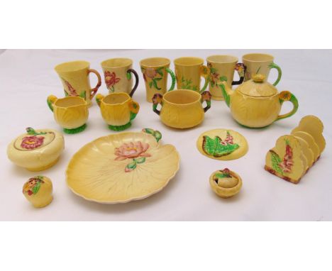 A quantity of Carltonware porcelain to include a teapot, mugs, a toast racks and plates (16)