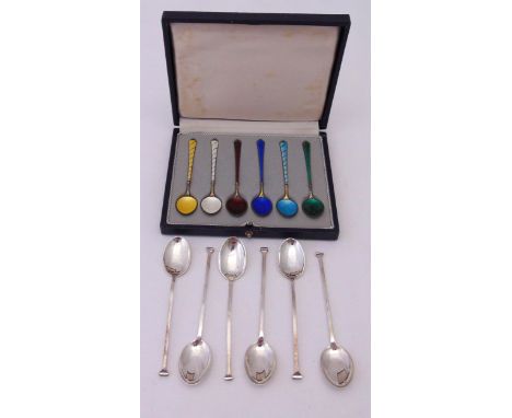 A cased set of Danish enamel and white metal coffee spoons and a set of six hallmarked silver slip top coffee spoons by Mappi