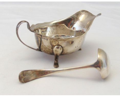 A hallmarked silver sauce boat and a hallmarked silver sauce ladle, Sheffield 1959 by Edward Viner, approx total weight 134g