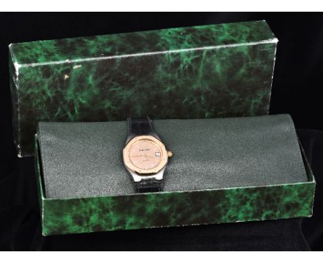A gentleman's Audemars Piguet automatic wristwatchThe champagne dial with batons and date aperture, the reverse of the case i