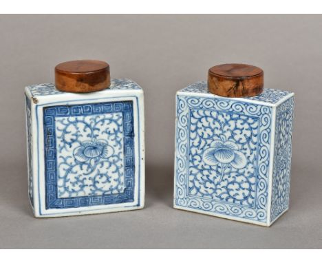 An 18th century Chinese blue and white porcelain tea caddy Of typical rectangular form, decorated in the round with floral sc