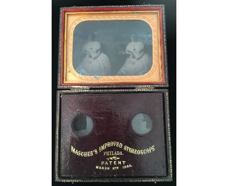 A 19th century Mascher's Improved Stereoscope ambrotype photographic portraitThe gilt tooled and hinged case enclosing a pair