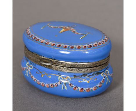 A 19th century Continental silver mounted enamel patch boxThe exterior decorated with trailing foliate garlands, the interior