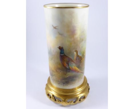 ROYAL WORCESTER CYLINDRICAL VASE RAISED ON A PIERCED GILT BASE, DECORATED PHEASANTS SIGNED JAS STINTON, PUCE MARK 6/161, APPR