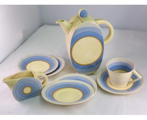 CLARICE CLIFF BONJOUR BIZARRE PART SERVICE COMPRISING COFFEE POT, CREAM JUG, SAUCERS, 1 COFFEE CAN AF TOGETHER WITH A SAUCER 