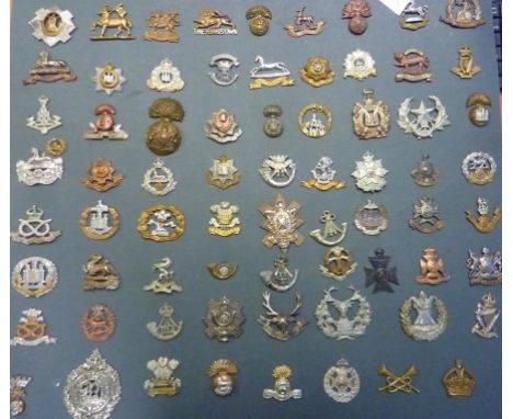 MILITARIA, A DISPLAY OF WWI BRITISH INFANTRY O/R CAP BADGES, A NEAR SET OF THE 68 REGIMENTS OF THE LINE