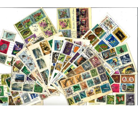 British Commonwealth stamp collection 60 post cards with interesting stamps from around the commonwealth states. We combine p