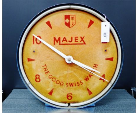 Vintage blue enamel framed Majex wall clock, the circular fabric dial with Arabic numerals and hour batons, and neon light su