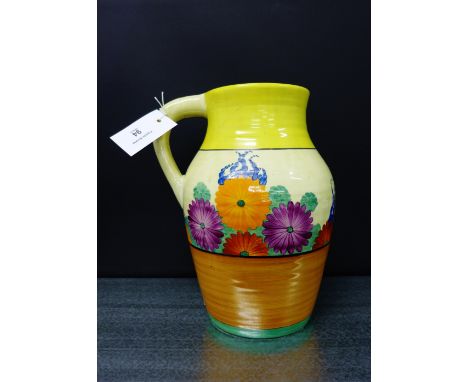 Clarice Cliff Bizarre Newport Pottery Gay Day pattern jug, in the ribbed lotus shape, with honey glaze and printed backstamps