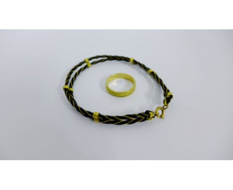 9 carat gold ring and an elephant hair bangle (2)