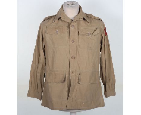 WW2 British 4th Army Corps Bush Shirt: Tan shirt with printed formation badges to shoulders with  buttons and label inside si