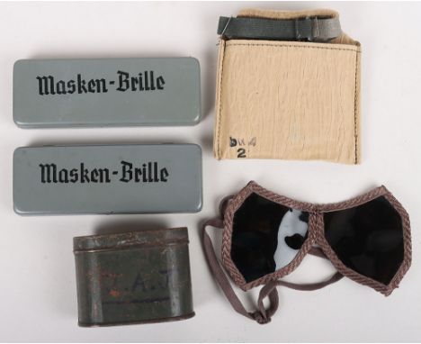 WW2 German Army Goggles: Two pairs of German  dust goggles one pair in issue envelope, pair of goggles in tin and two pairs o