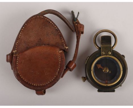 WW1British Army Officers Compass: Officers brass compass with makers and  date 1917 to base, housed in original brown leather