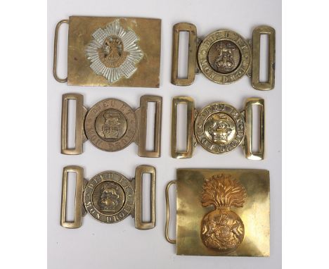 Military Buckles: Four army inter locking brass buckles with Victorian , Kings and Queen Elizabeth crowns , Fusilier and Roya