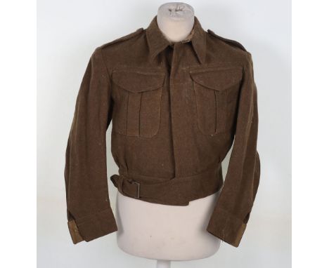 WW2 Battle Dress Blouse: White label inside with size 9 ,makers Montague Barton ,arrow and dated June 1941, stamped and named