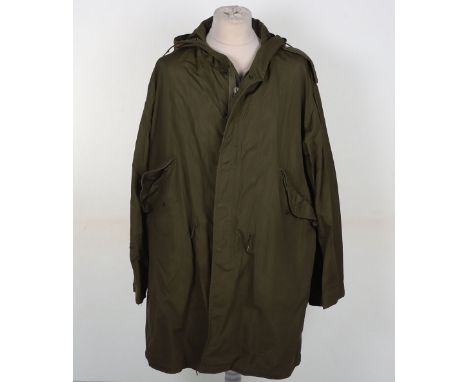 US Army Parka Shell: Green combat parka shell liner with buttons and stamped with maker and date March 12 1951. 