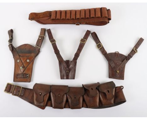 WW1 Ammunition Bandolier: Brown leather bandolier with brass metal work stamped by maker and dated 1915 with three officers s