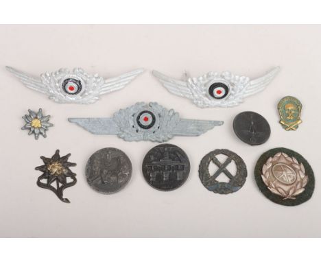 WW2 German Military Badges: Three Luftwaffe cap wreaths two alloy, one zinc all with pins to back,  army drivers badge , day 