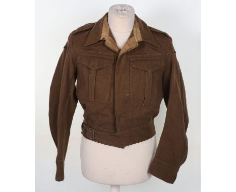 WW2 Royal Engineers Battle Dress Blouse:  A good clean example with RE title and badges to arms with brass and plastic  butto