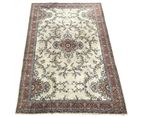 Grovsner Wilton - Persian design sage green ground carpet, central floral design medallion surrounded by trailing flower head