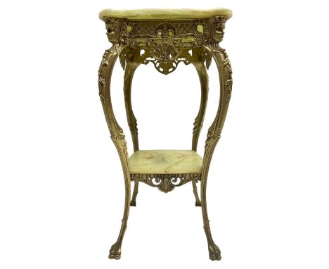 Italian design onyx and gilt metal two-tier lamp table, shaped top over pierced and cartouche decorated frieze, the female ma