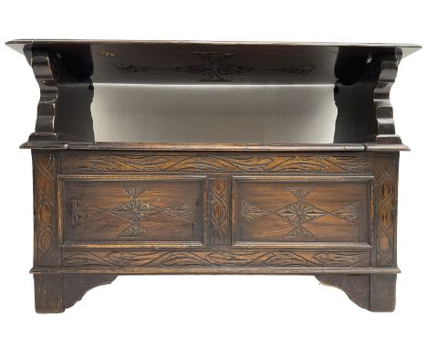 17th century design stained oak monks bench, hinged metaphoric table back, over hinged box seat compartment, the panelled fro