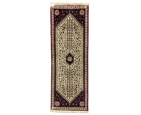 Persian Abadeh indigo ground runner rug, ivory field with pole medallion surrounded by plant and bird motifs and contrasting 