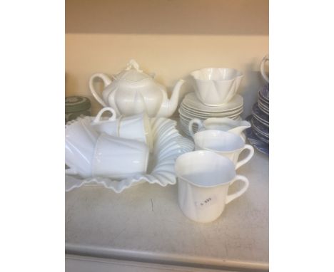 SHELLEY WHITE CHINA APPROX. 22 PIECES N4CONDITION:   BROWNING/STAINING PRESENT ON TEAPOT AND SOME PLATES, CRACKS TO DISH.  6 