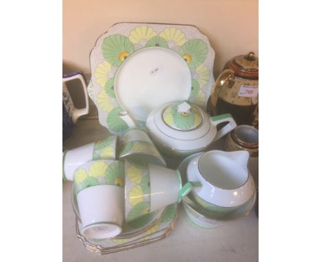 ART DECO GLADSTONE CHINA TEA WARE K3CONDITION:   HAIRLINE IN ONE CUP, CRACK TO MILK JUG, MARKS TO CAKE PLATE, HANDLE OFF ONE 