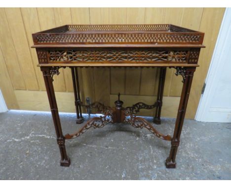 A REPRODUCTION MAHOGANY CHIPPENDALE STYLE SILVER TABLE H-68 W-62 CM