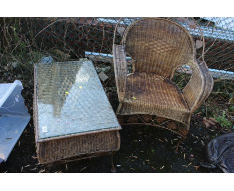 A WICKER AND WIREWORK GLASS TOP TABLE AND ARMCHAIR