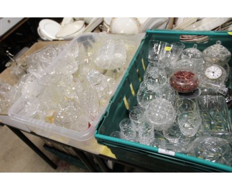 THREE TRAYS OF MOSTLY CUT GLASS TO INCLUDE DECANTERS, DRINKING GLASSES ETC. 