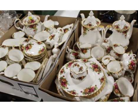 TWO TRAYS OF ROYAL ALBERT OLD COUNTRY ROSES CHINA TO INCLUDE TEA AND COFFEE POTS, DINING PATES, CUPS AND SAUCERS ETC. 