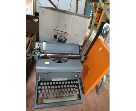 A VINTAGE IMPERIAL TYPEWRITER, PAPER GUILLOTINE AND A PAXIMAT PROJECTOR (3) 
